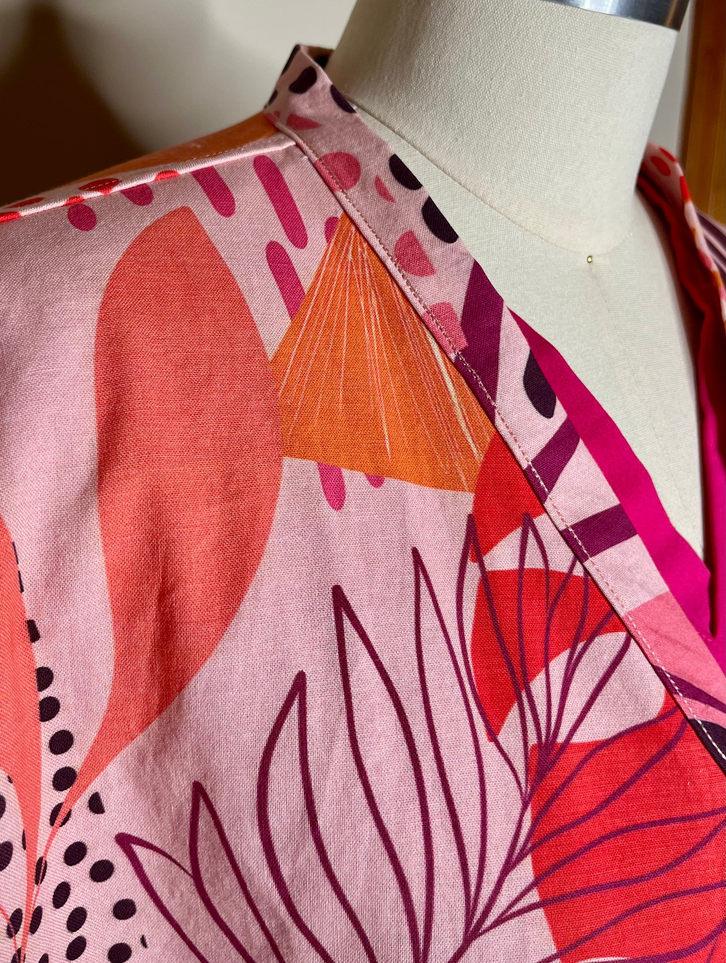 Pink Papaya Statement Scrub Jacket for Nurses and Healthcare Providers by Angelika Gale (Cancer Survivor)